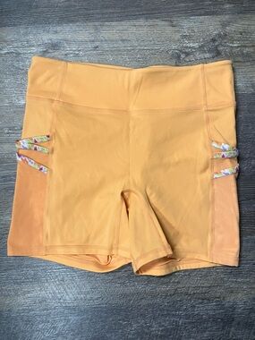 Fabletics Peach-Orange Bike Shorts with Floral Side Straps